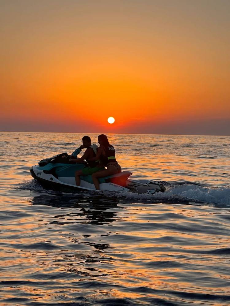Jet skis out at golden hour