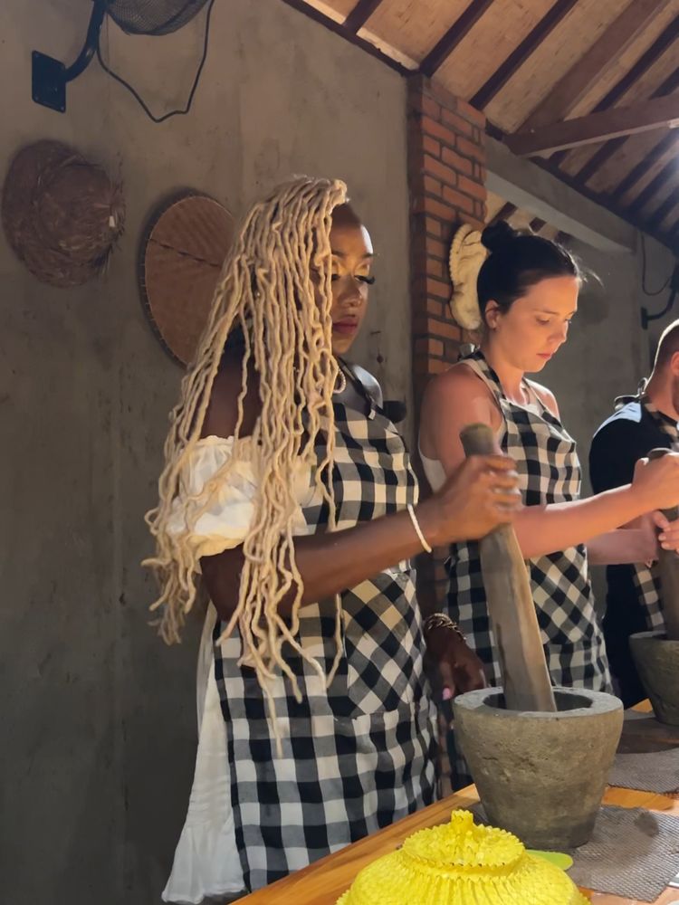 Everyone at the mortar, grinding the base paste